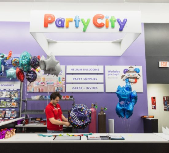 a worker inflating a balloon